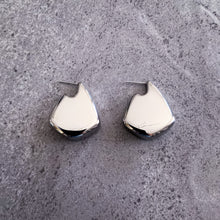 Load image into Gallery viewer, Teuila Fatupaito Mirror Luxe Studs in silver plated stainless steel, side angle view showing modern design