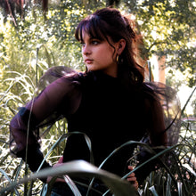 Load image into Gallery viewer, Teuila Fatupaito Aurora Hoops being worn, demonstrating the elegant 40mm size and golden glow against skin