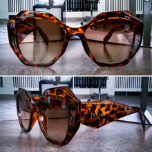Load image into Gallery viewer, Teuila Fatupaito Honeyz sunglasses, close-up detail of geometric frames and UV400 protective lenses with
Tortoiseshell frames.