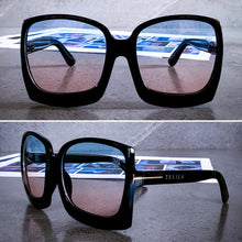 Load image into Gallery viewer, Teuila Fatupaito Boulevard sunglasses, close-up detail of sleek frame and stylish silhouette - black frames