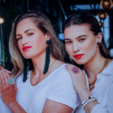 Load image into Gallery viewer, Teuila Fatupaito Coral Red Ring worn on finger, demonstrating how the vibrant coral piece sits on the hand