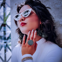 Load image into Gallery viewer, Model wearing Teuila Fatupaito Coral Green Ring on hand, demonstrating how the ring looks when worn and its proportional size