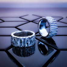 Load image into Gallery viewer, Angled view of Teuila Fatupaito Jagged Edge Band Ring showcasing the contrast between peaks and valleys in the jagged design