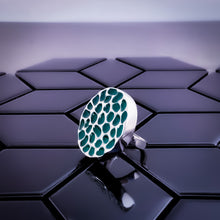 Load image into Gallery viewer, Close-up of Teuila Fatupaito Coral Green Ring showing band details