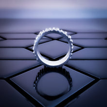 Load image into Gallery viewer, Overhead view of Teuila Fatupaito Jagged Edge Band Ring displaying the complete serrated pattern around the band