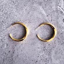 Load image into Gallery viewer, Teuila Fatupaito Aurora Hoops in 18k gold plated stainless steel, close-up detail showing smooth golden finish
