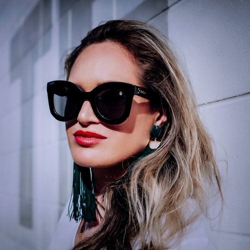 Woman wearing Teuila Fatupaito's black sunglasses Ms Jackson