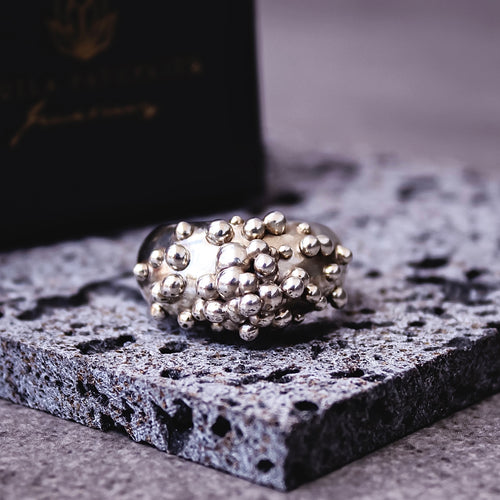 Teuila Fatupaito Plerogyra Ring Series - Round shape in 925 sterling silver, close-up of textured surface detail.