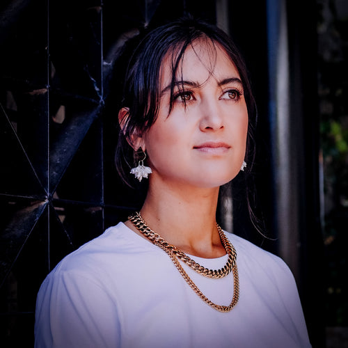 Model wearing Cuban link chain by Teuila Fatupaito