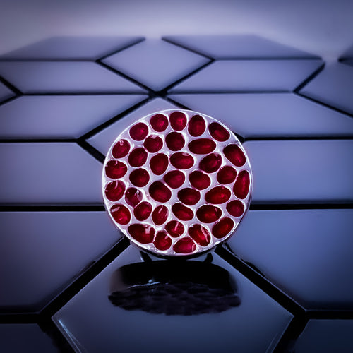 face view and close-up of Teuila Fatupaito Coral Red Ring 