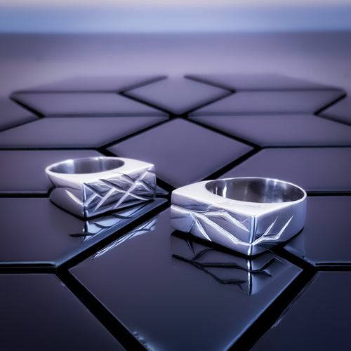 Pair of Teuila Fatupaito Fractured Rec Rings featuring unique rectangular design with textured fractured surface in 925 sterling silver